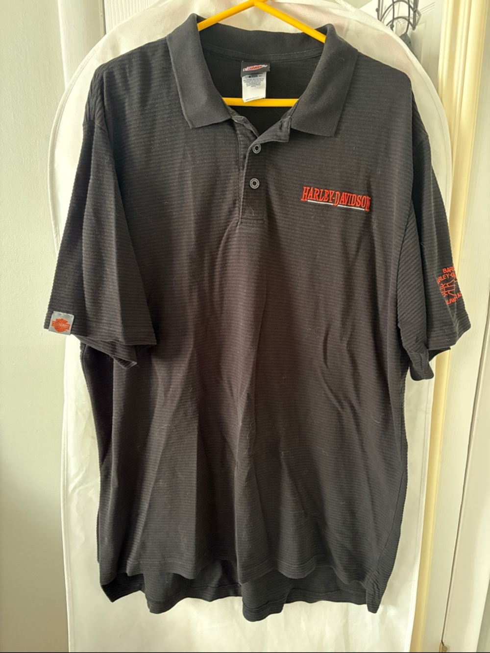 Harley-Davidson - Black Polo with Orange Logos from "Barbs Harley Davidson"